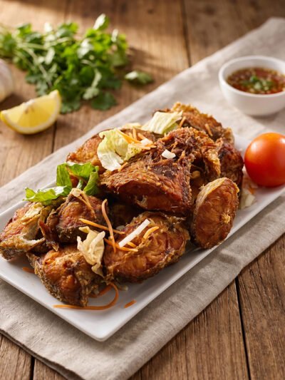 Fried-fish-served-with-banku-or-jollof-rice