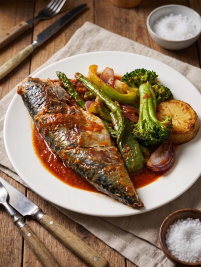 Spicy Grilled Mackreal with Banku or Jollof Rice at aircuisinedishes