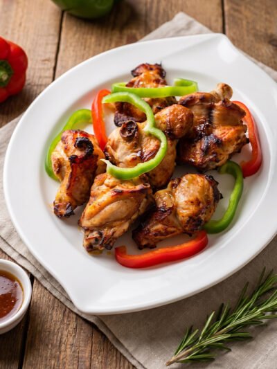 Spicy-grilled-turkeys-wings-with-jollof-rice,-fried-rice-or-fried-yam